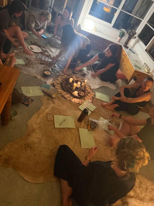 Women sharing, writing and connecting in circle